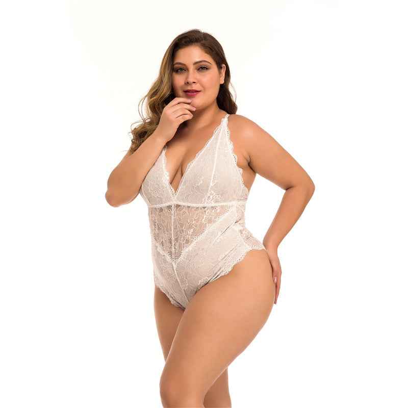 Woman wearing a white lace bodysuit on a white background