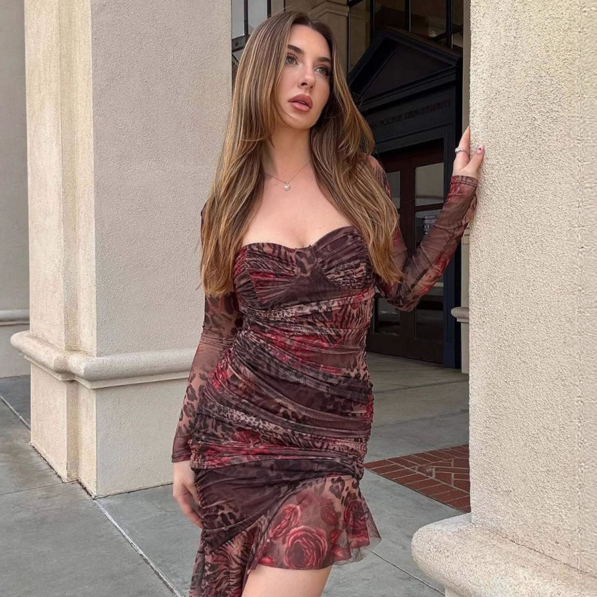 Ruched sweetheart mesh mini dress in dark rose and black print, long sheer sleeves