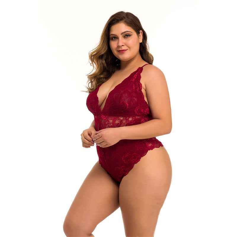 Woman wearing a red lace lingerie set on a white background