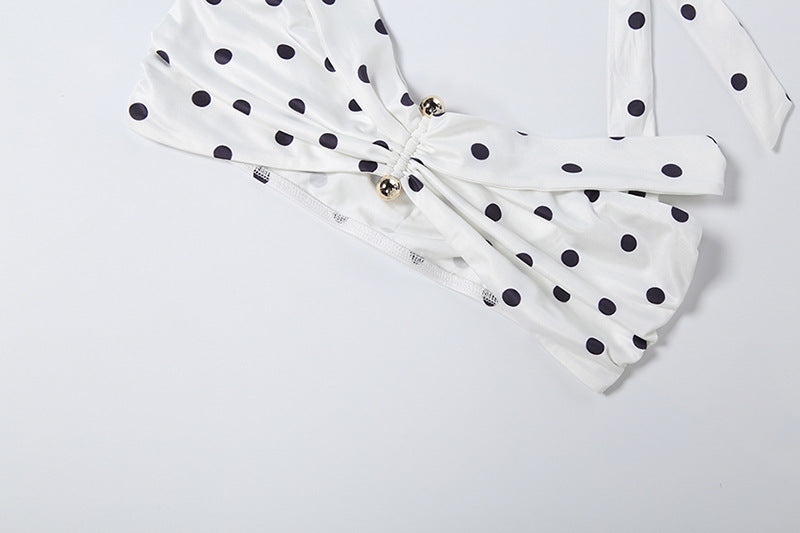 White polka-dot off-shoulder top with ruched center and waist bow detail