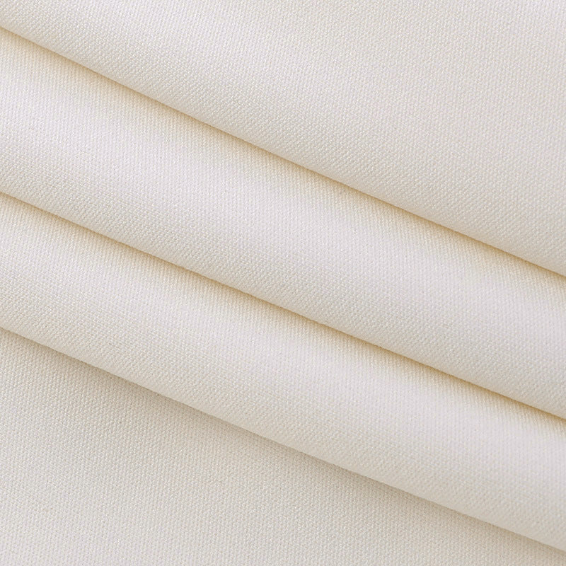 Light apricot textured fabric swatch for mini halter dress
