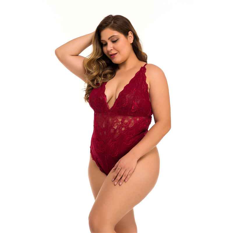 Woman wearing a red lace lingerie set on a white background