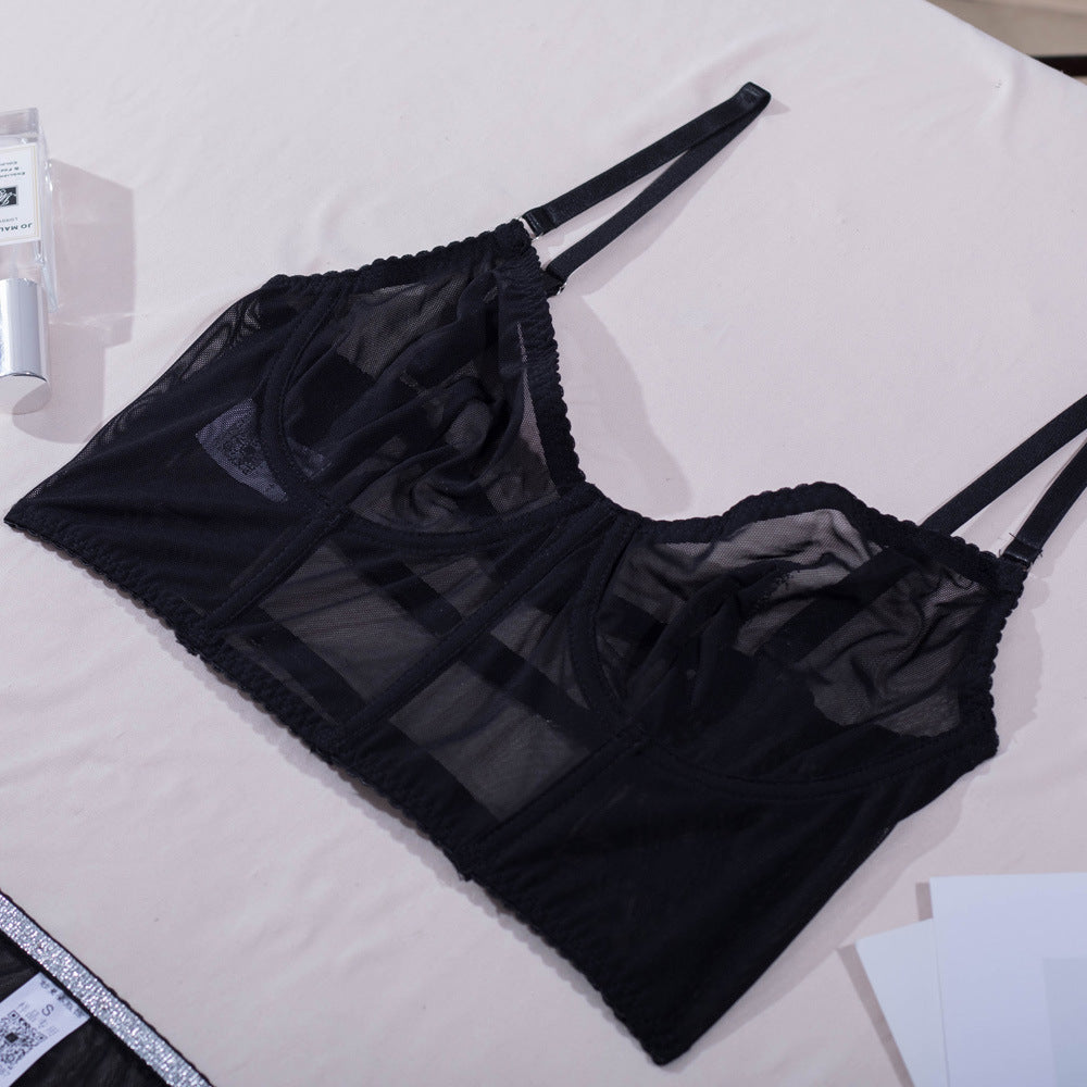 Black sheer mesh lingerie set with center bow detail and matching thong