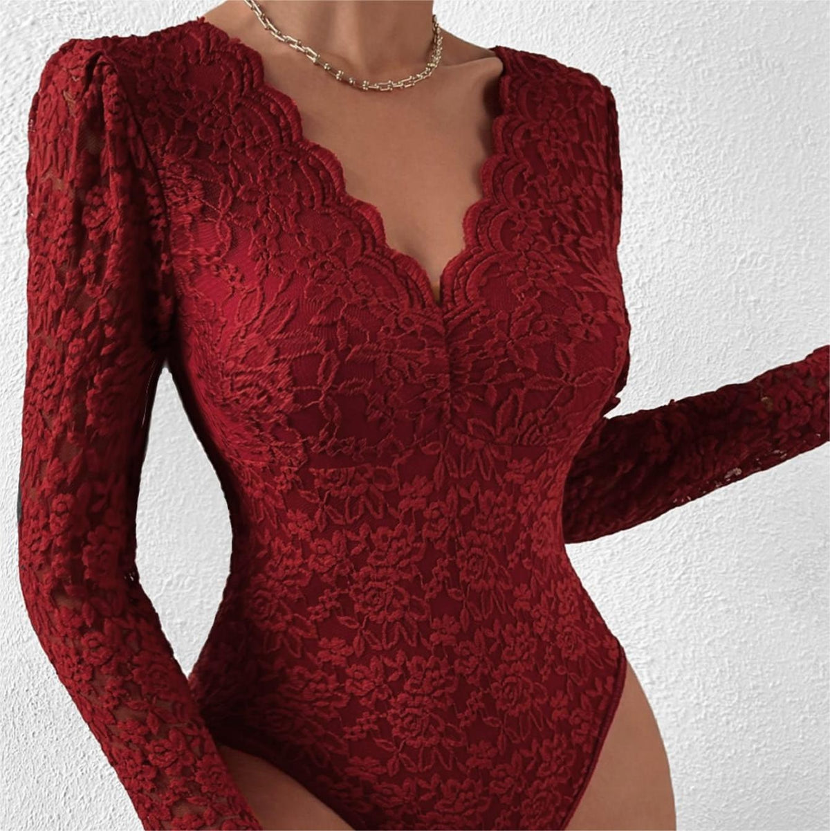 Wine lace bodysuit with scalloped V-neck and long sleeves, floral lace texture