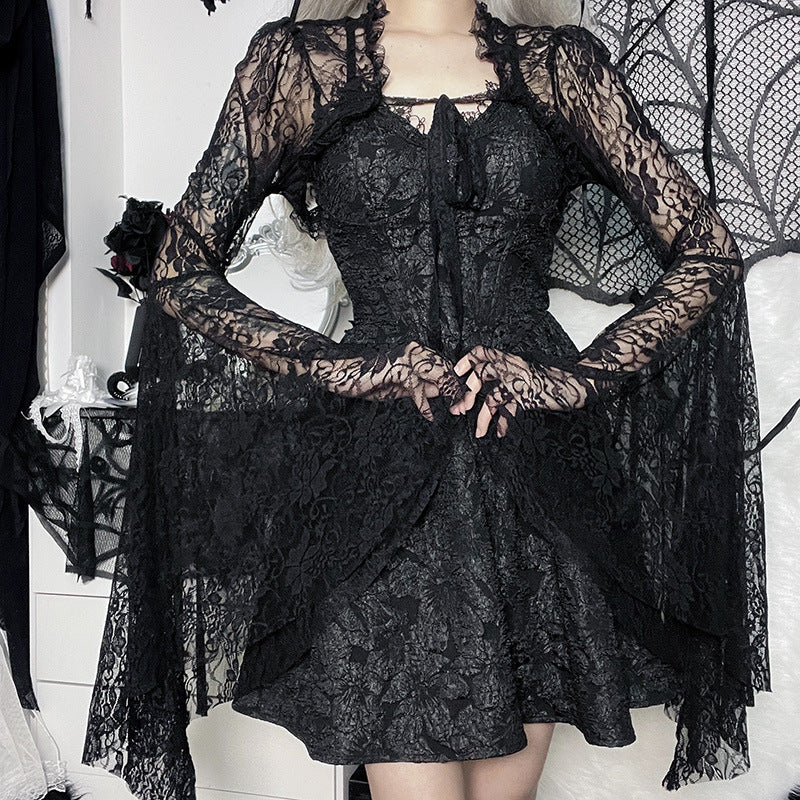 Black lace crop top with long flared sleeves, scalloped neckline and ruffle trim