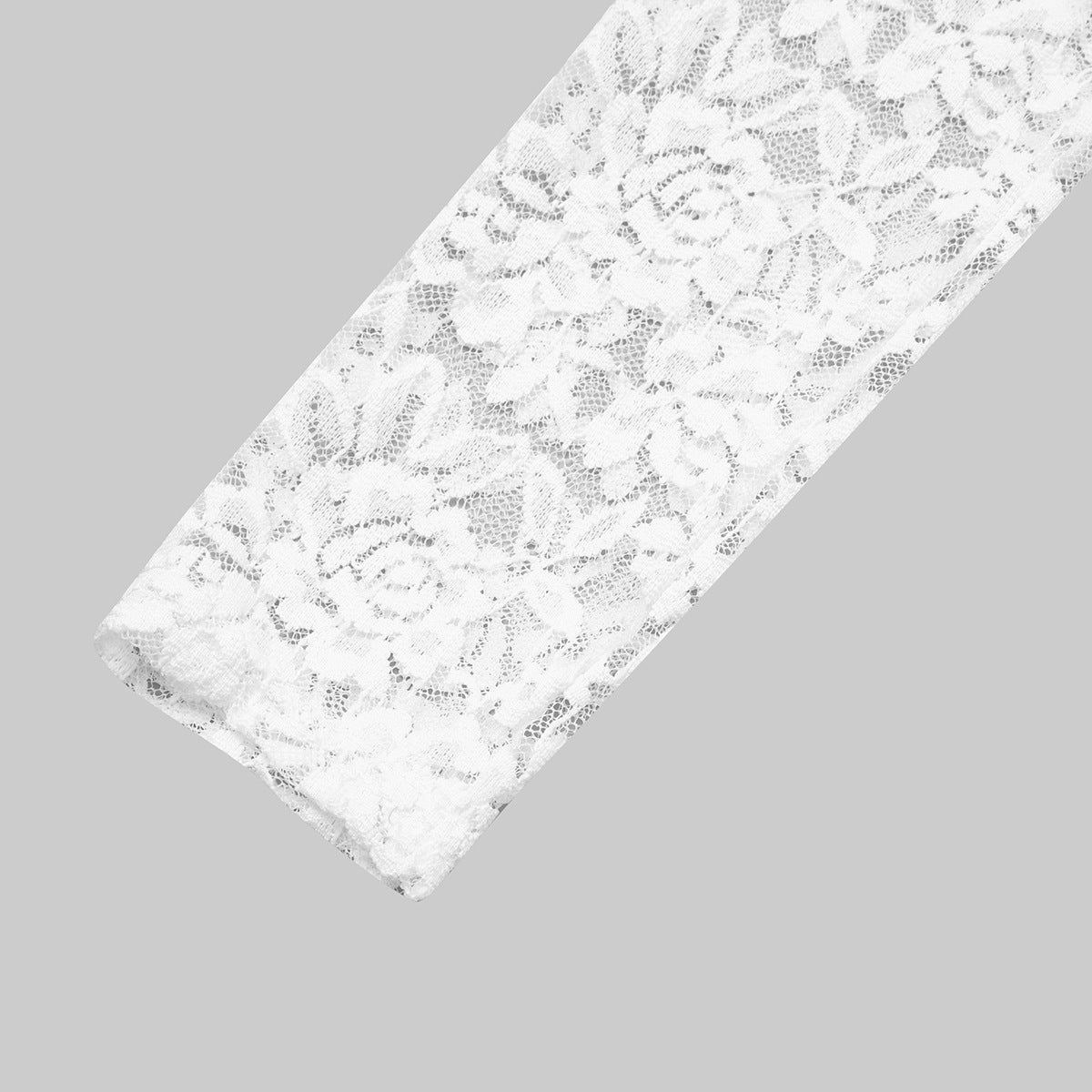 White lace long-sleeve bodysuit sleeve detail with scalloped edge