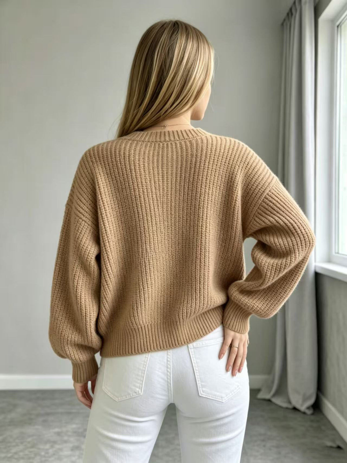 Caramel knit cardigan with open back and balloon sleeves, ribbed knit fabric