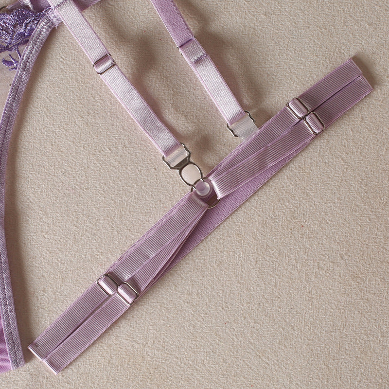 Lilac adjustable garter straps with metal clips, linking bands, and ring detail