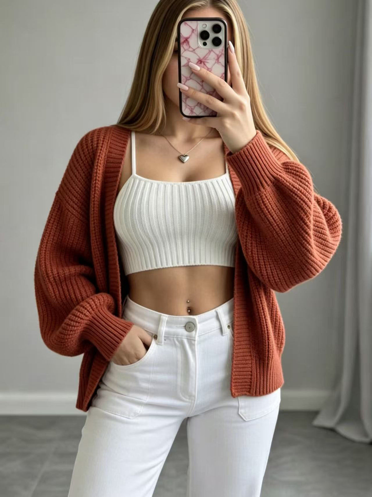 Burnt orange open-front knit cardigan with balloon sleeves