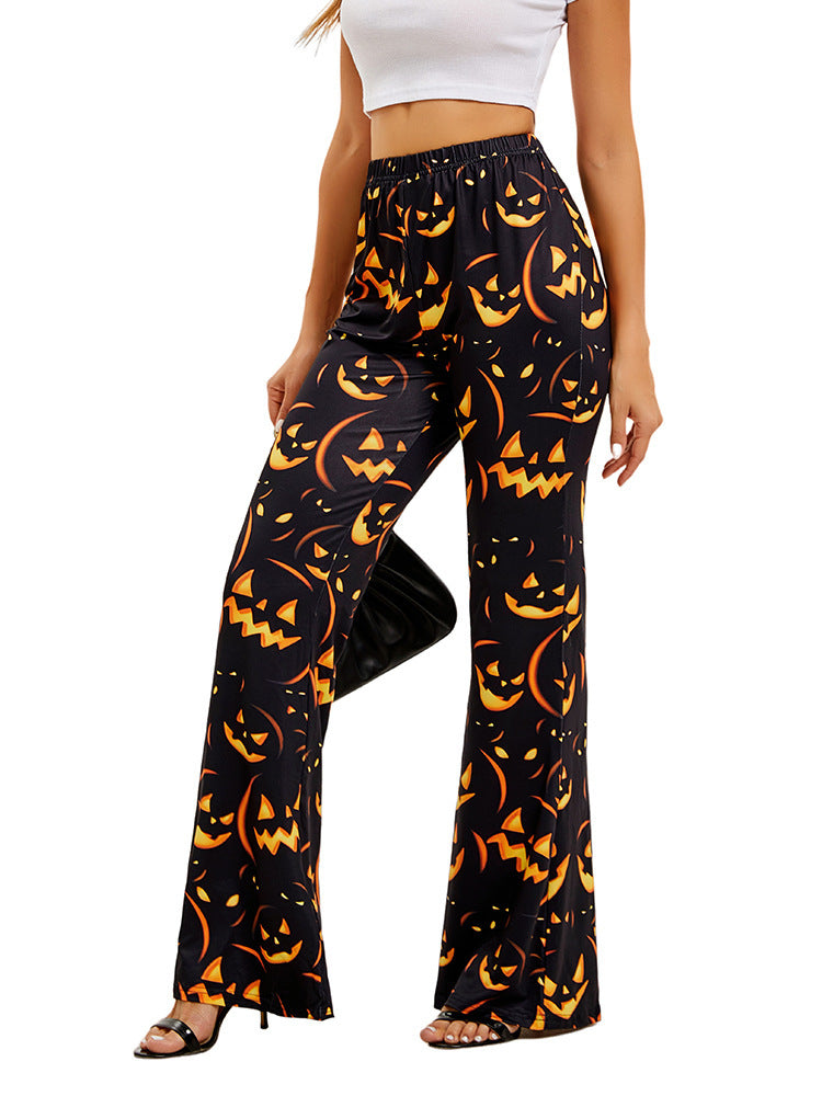 Women’s flared Halloween trousers, black with orange jack-o’-lantern allover pattern