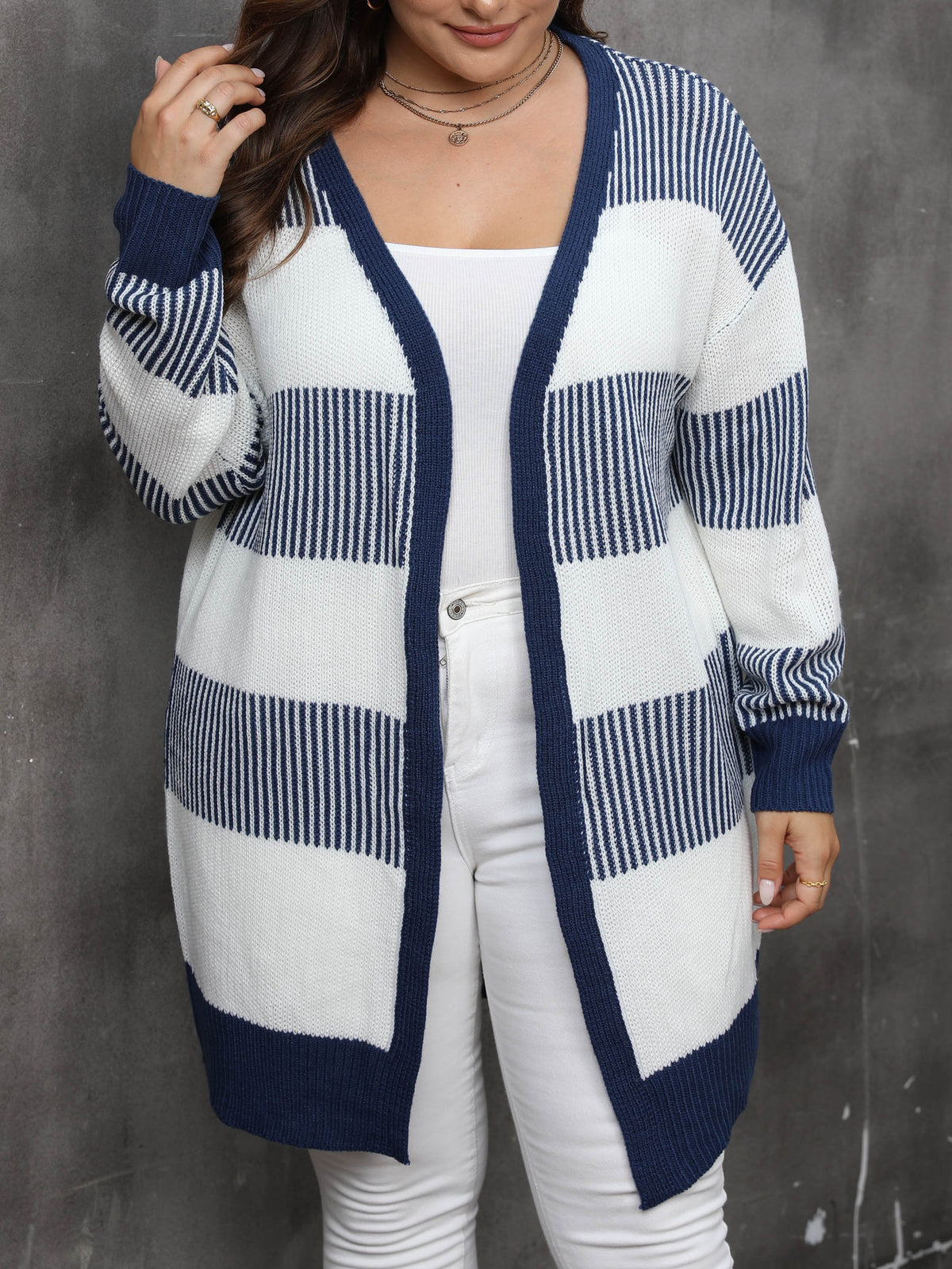 Plus-size striped knit cardigan sweater coat in white and navy blue color blocks