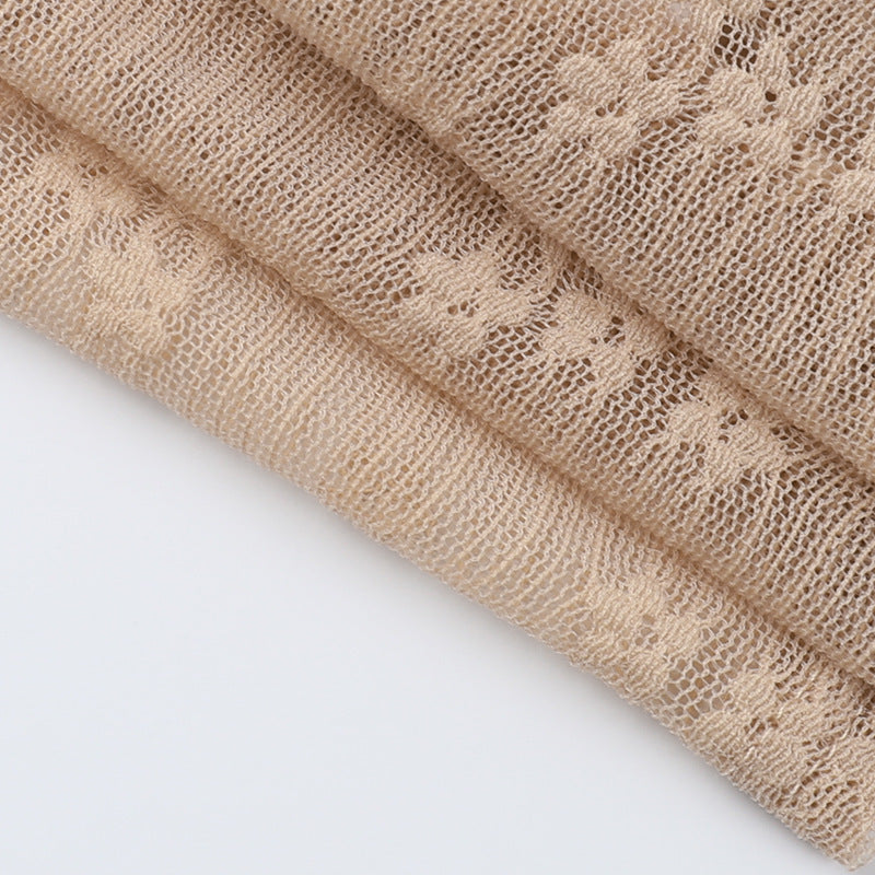 Khaki lace crop top fabric close-up with airy openwork texture