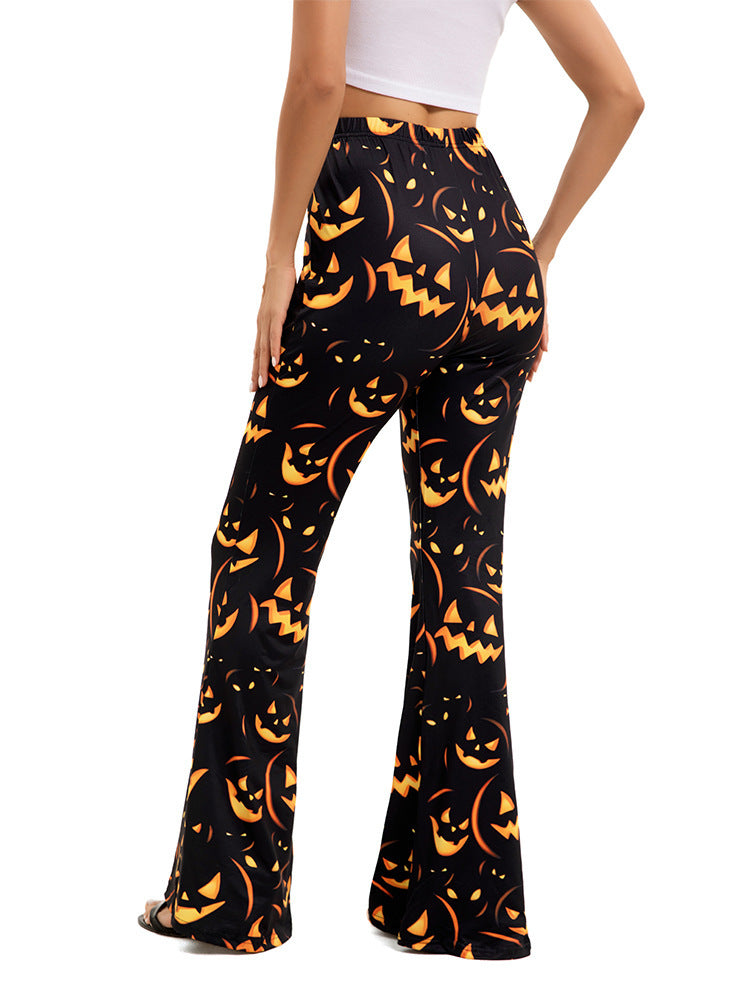 Close-up of women’s wide-leg Halloween pants, black with orange jack-o’-lantern pattern