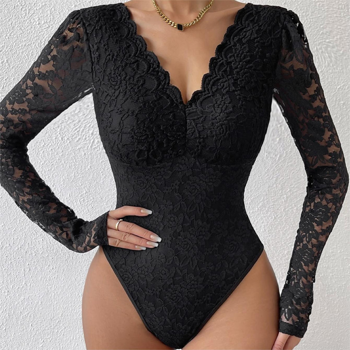 Black long-sleeve lace bodysuit with scalloped V-neck and full rear coverage