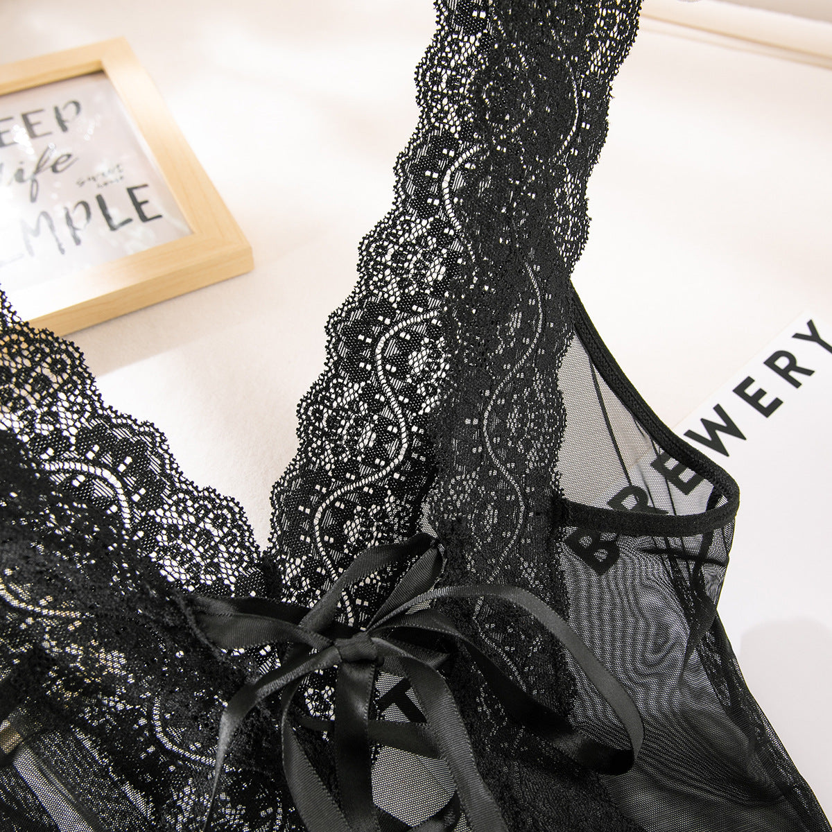 Black lace-trim mesh chemise neckline with lace-up detail