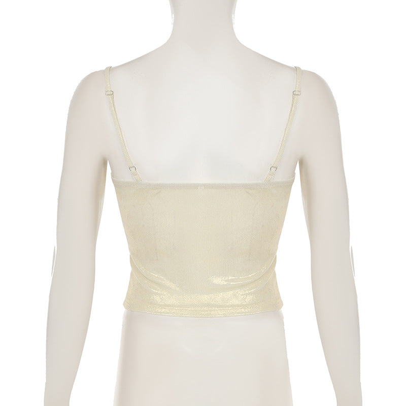 Beige twist-front cami top with slim spaghetti straps and shaped bust seams