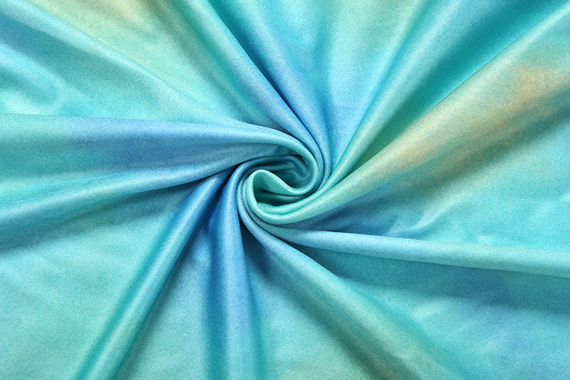 Turquoise satin-like draped fabric with soft sheen and gathered folds