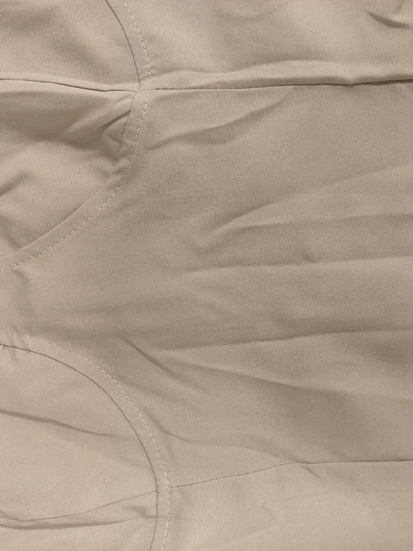 Close-up of beige fabric texture