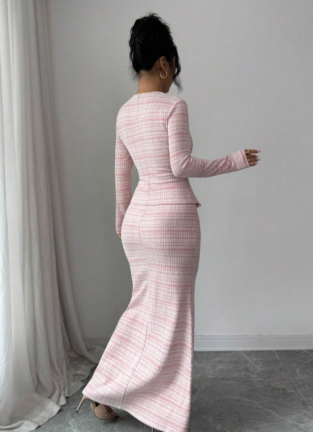Back view of pink plaid peplum top and maxi skirt with flared hem