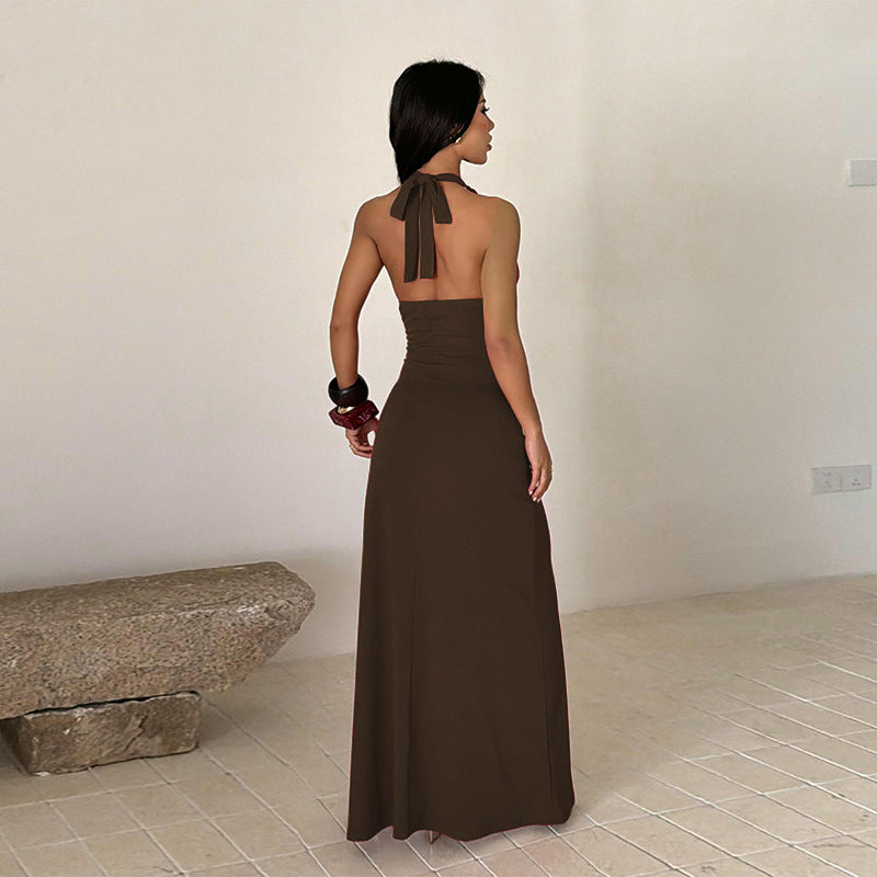 Brown halter-neck maxi dress with open back straps and long side slit