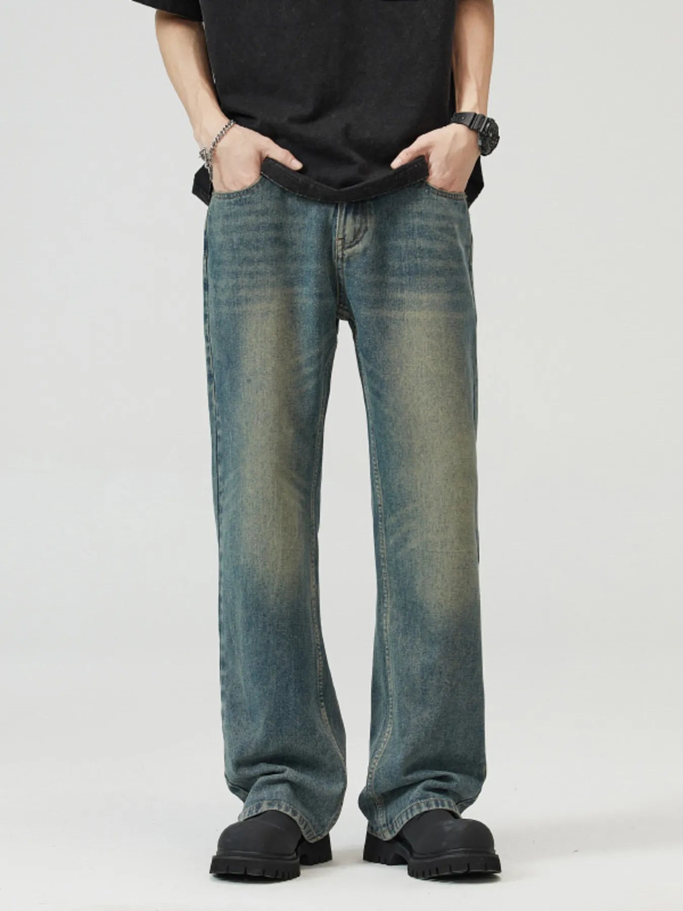 Trendsi men's plus size straight leg jeans faded blue relaxed fit with hands in pockets and black shoes