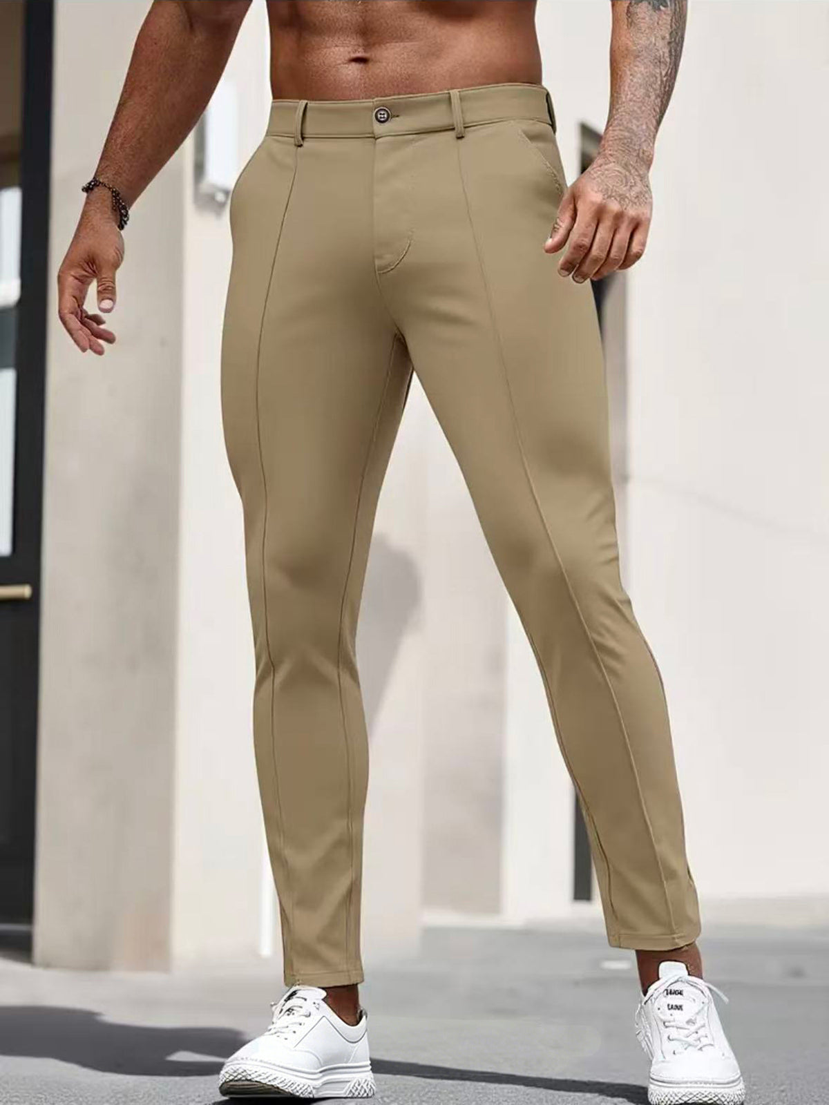 Men's slim-fit dark khaki dress pants with front seams and tapered leg
