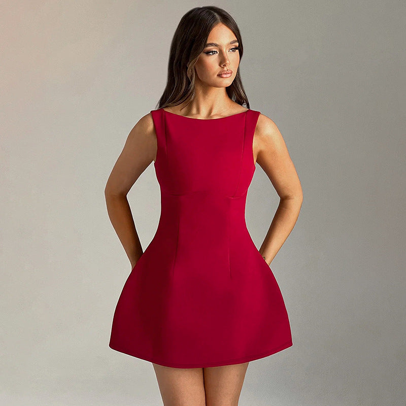 Stylish model wearing an Elegant Black Dress featuring a fitted silhouette and sleeveless design