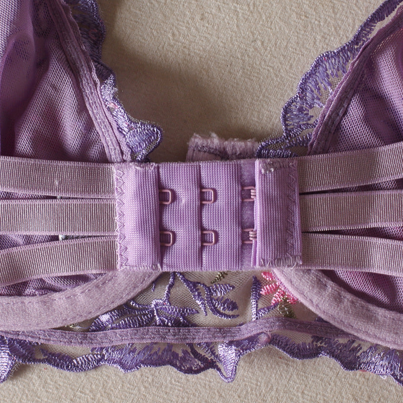 Lilac bra back with hook-and-eye closure and scalloped floral lace trim