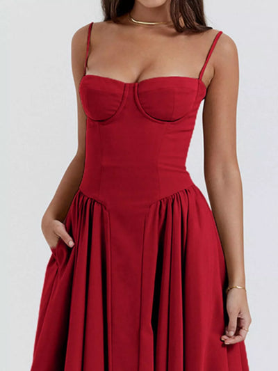 Red dress worn by a person on a white background