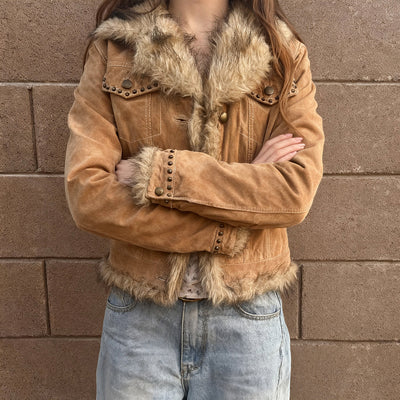 Khaki fur-lined patchwork jacket with studded shoulders and snap-button closure, long sleeves