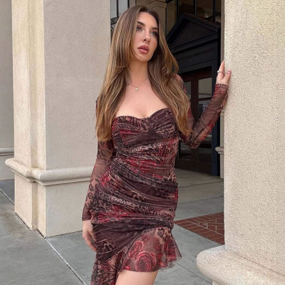 Ruched sweetheart mesh mini dress in dark rose and black print, long sheer sleeves