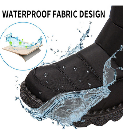 Black waterproof-look winter ankle boot with water-splash protection, close-up toe.