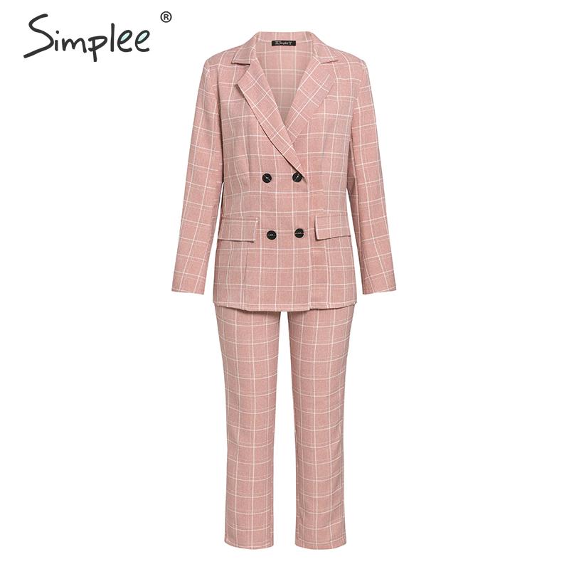 Pink plaid double-breasted blazer with black buttons and cropped pants, front view