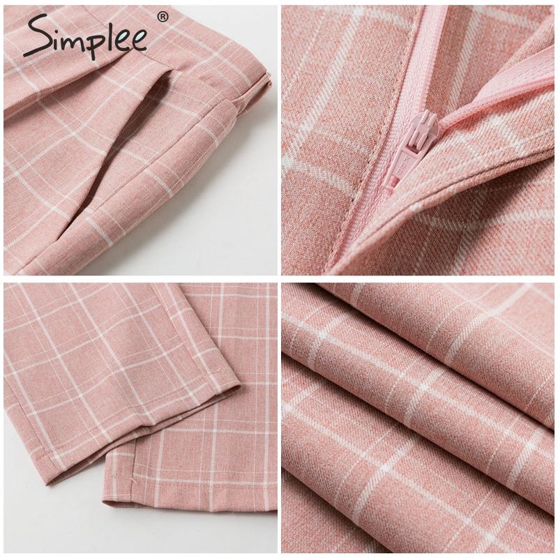 Pink plaid cropped pants seam and zipper close-ups, folded hem and fabric texture