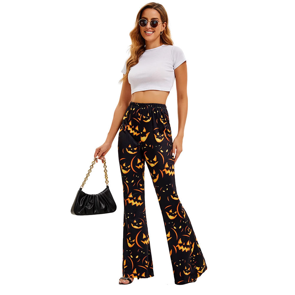 Women’s flared Halloween trousers, black with orange jack-o’-lantern print