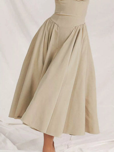 Beige dress on a white background
