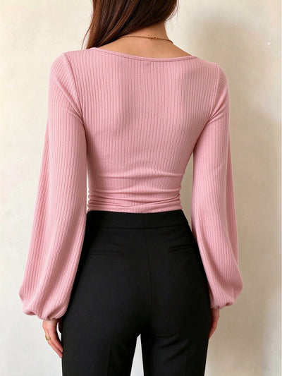 Pink ribbed knit square-neck long-sleeve top with lantern sleeves, back view
