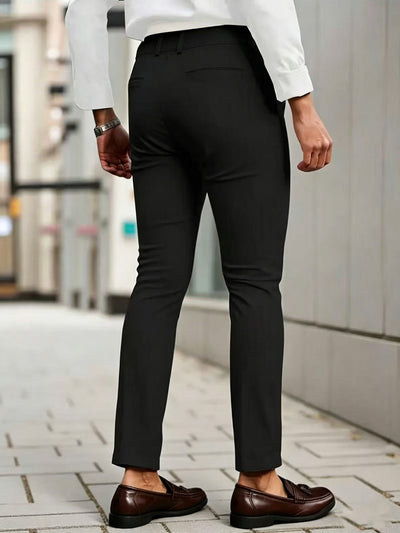 Men's slim-fit cropped dress pants in black with front crease seams