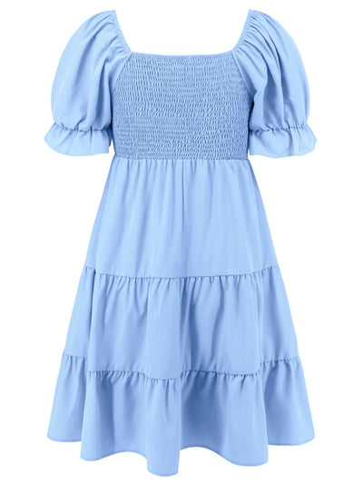 Light blue tiered mini dress back view with puff sleeves and smocked waist yoke