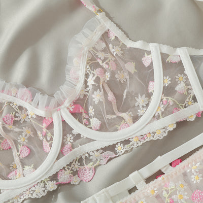 Floral embroidered mesh bra with white ruffle trim and scalloped lace edging, bow accents