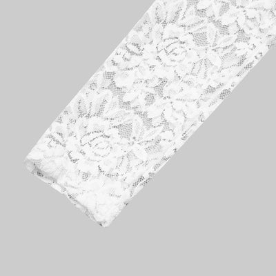 White lace long-sleeve bodysuit sleeve detail with scalloped edge