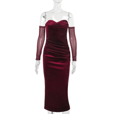 Burgundy one-shoulder suede pleated dress with long sheer sleeves and a mid-length straight skirt.