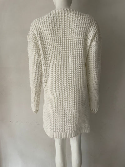 White knit sweater mini dress, back view with V-neck shaping and long sleeves