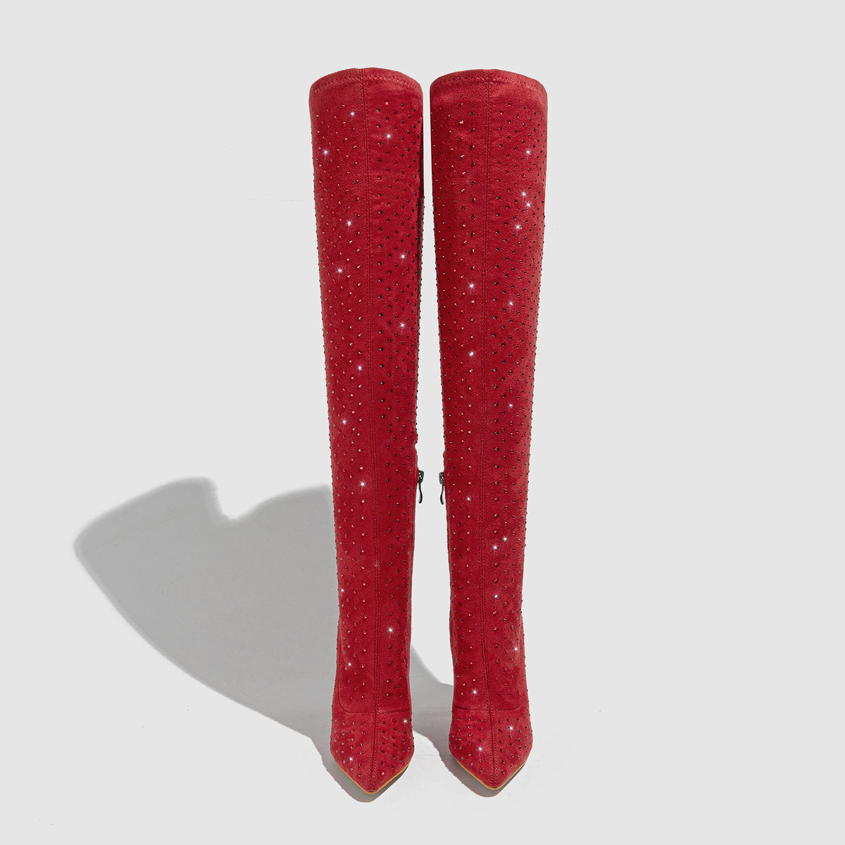 Red over-the-knee stiletto boots with sparkly finish, front view pair