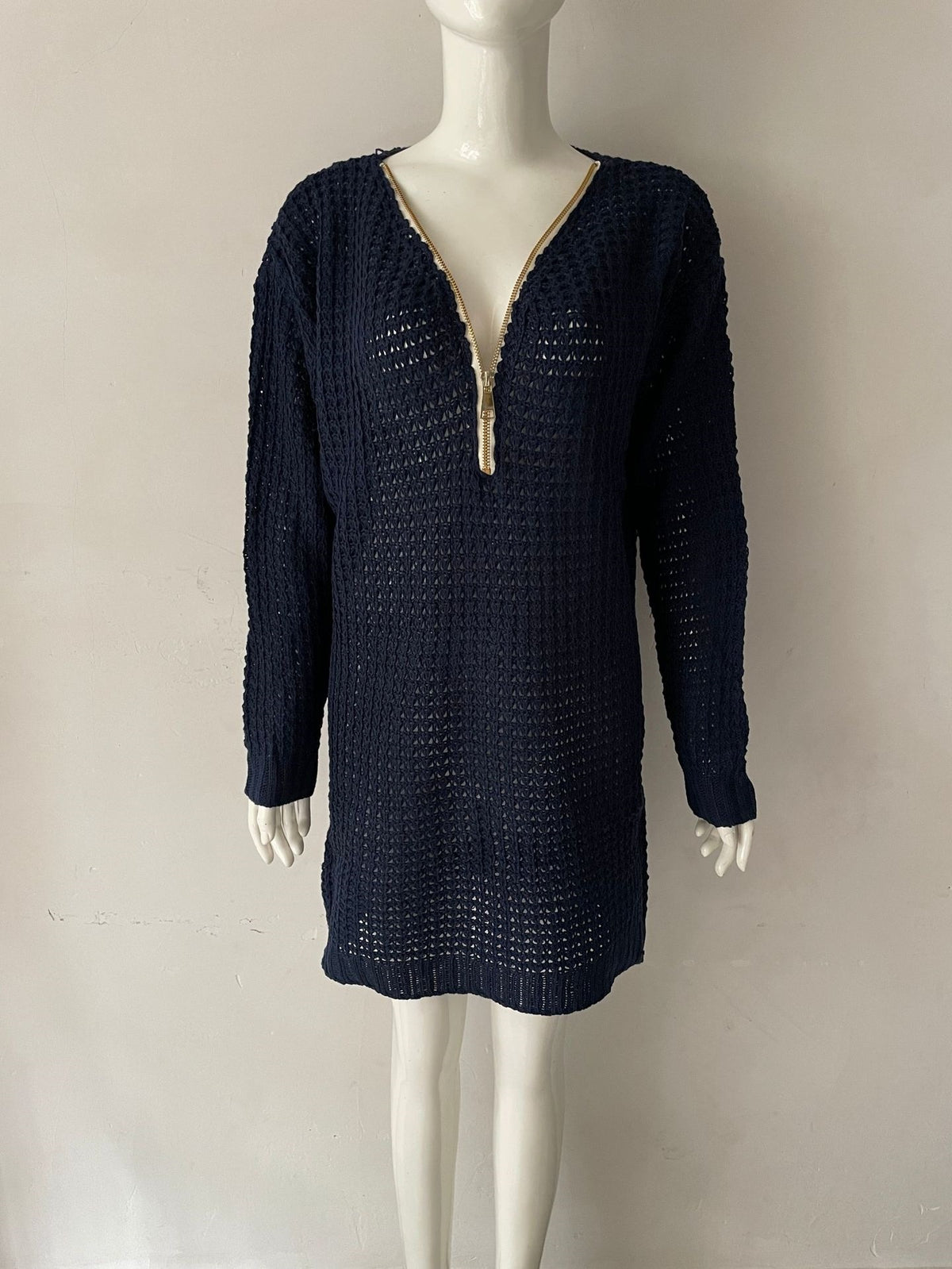 Navy knit sweater dress with V-neck zip neckline and ribbed cuffs, long sleeves