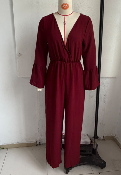 V-neck wide-leg jumpsuit in burgundy with gathered waist and long flared sleeves