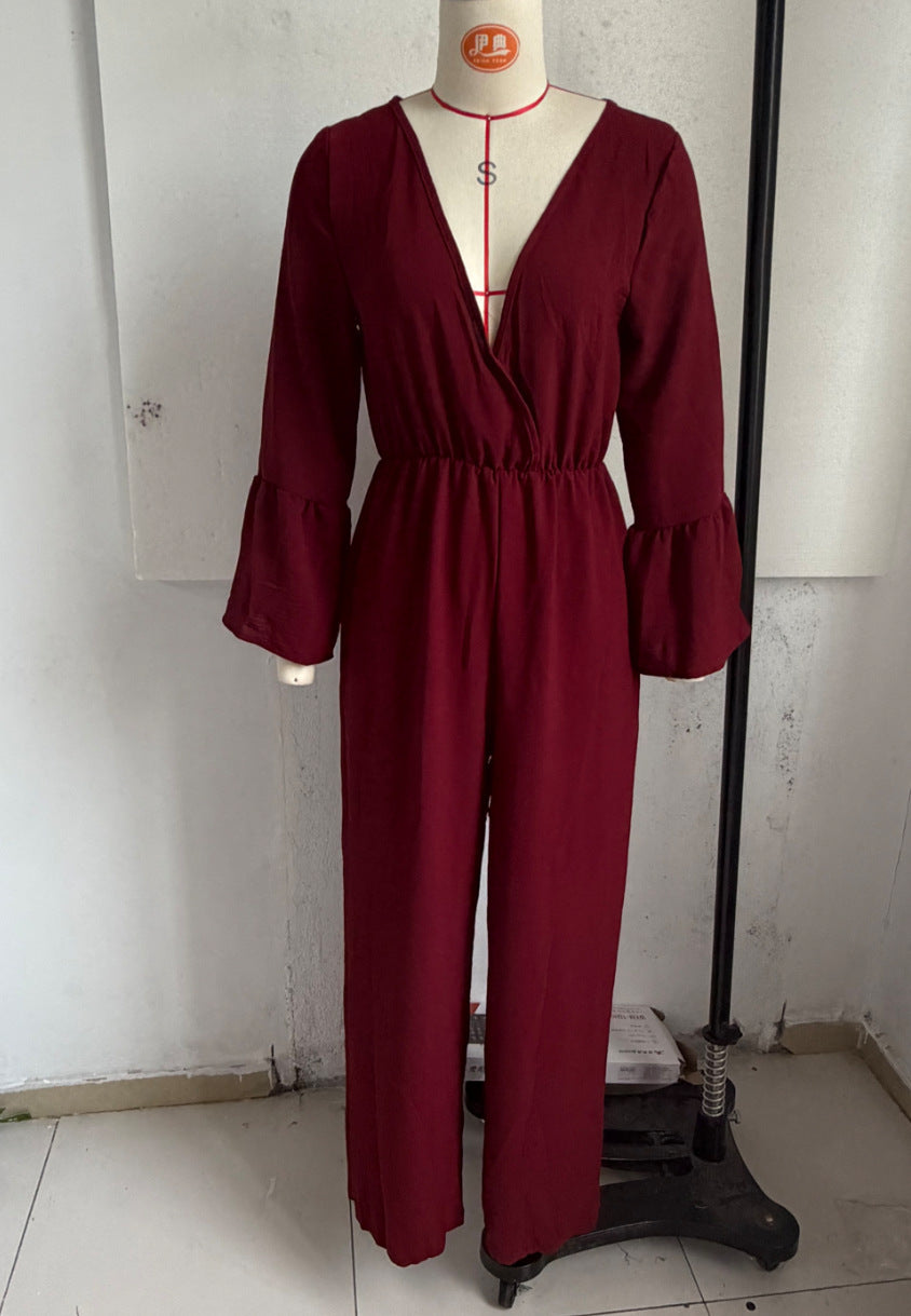 V-neck wide-leg jumpsuit in burgundy with gathered waist and long flared sleeves