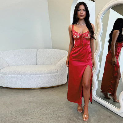 Red satin slip dress with lace bodice, spaghetti straps, and thigh-high front slit