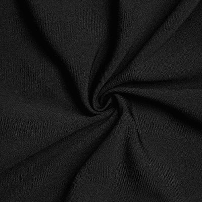 Black dress fabric close-up with smooth, textured weave