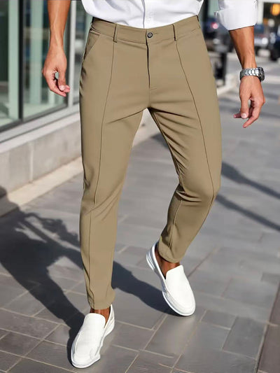 Men's slim-fit cropped dress pants in light khaki with front crease seams